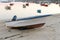 Wooden fishing boat dries ashore