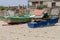 Wooden fishing boat dries ashore