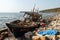 Wooden fishing boat from North Korea, shipwrecked after a storm off the coast of the Vladivostok