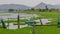 Wooden fishing boat on a swamp marsh lake water. Patches of green vegetation are seen. Photo taken near chilika lake, rambha