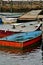 Wooden fishing boats tied to a dock