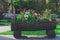 Wooden flowerbed with petunia flowers