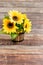 Wooden Flowerpot filled with Sunflowers