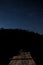 Wooden footbridge at the background of the starry sky