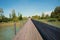 Wooden footbridge lake Zurichsee, view to the castle, tourist resort Rapperswil switzerland