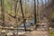 A Wooden Footbridge over a Mountain Stream