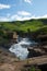 Wooden footbridge over  rapids of mnweni river