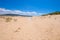 Wooden footpath covered on sand in Trafalgar Cape