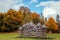 Wooden fortification by Tustan rocks in autumn ukrainian national park. Tourist's attraction in Carpathian mountains