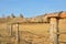 Wooden fortress in the field, old Russian wooden structure, village tower in the field