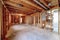 Wooden foundation inside an unfinished basement of a house