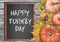 Wooden frame and fruits for happy turkey day