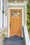 Wooden front door with three glass panels at San Francisco, California