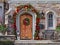 Wooden front door with wreath