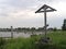 Wooden funeral cross on the bank of the White Sea. Karelia, Russ