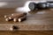 Wooden furniture parts and pile of dowels, closeup. Self-assembly