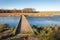 Wooden gangway over blue rippling water