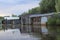 Wooden garages for storing fishing boats on the river in the village