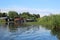 Wooden garages for storing fishing boats on the river in the village