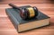Wooden gavel on book. Justice and law concept