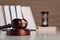 Wooden gavel and books