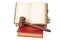 Wooden gavel and old opened law book