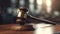 Wooden gavel over defocused background Front view with selective focus Great use for law, justice and auction related concepts