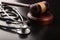 Wooden gavel and stethoscope close-up view