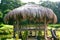 wooden gazebo, roofed with coconut leaves