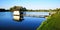 Wooden Gazebo on summer lake