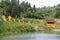 Wooden gazebos on shore of lake in Carpathians