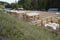 Wooden gazebos under construction on the sandy beach of the Volga River. Ulyanovsk. Russia