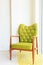 Wooden green arm chairs in living room