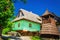 Wooden green hut and belfry in Vlkolinec, Slovakia