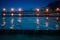 Wooden groynes and light - night photograph