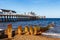 Wooden Groynes and Pier at Southwold Beach, UK