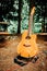 Wooden Guitar in Woods at Outdoors Indie Wedding