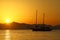 Wooden Gulet returning to the harbor at sunset.