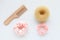 Wooden Hairbrush, barrette and Pink Scrunchy isolated on white. Flat lay Hairdressing tools and accessoriesas Color Hair