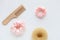 Wooden Hairbrush, barrette and Pink Scrunchy  on white. Flat lay Hairdressing tools and accessoriesas Color Hair