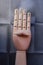 Wooden hand with four fingers raised and numbered with numbers one, two, three and four