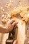 Wooden hand plane. Closeup of woodworker`s hands shaving with a plane in a joinery workshop