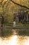 Wooden handcrafted house decoration by the river at golden hour