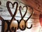 Wooden Hanger with a shadow in the shape of a heart