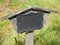 Wooden headstone in the public cemetery