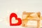 Wooden heart with a bow on a bench on a white background. Valent