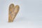 Wooden heart with many sharpen silver glittering hearts in snow