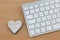 Wooden Heart next to Keyboard