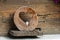 Wooden heart outside of a rustic barn