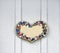 Wooden heart with painted flowersr